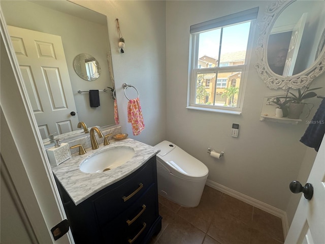 8809 White Sage Loop, Lakewood Ranch, FL 34202 - half bathroom featuring tile patterned floors and vanity