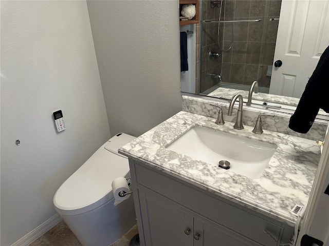 8809 White Sage Loop, Lakewood Ranch, FL 34202 - full bathroom featuring vanity, tiled shower, and a textured wall