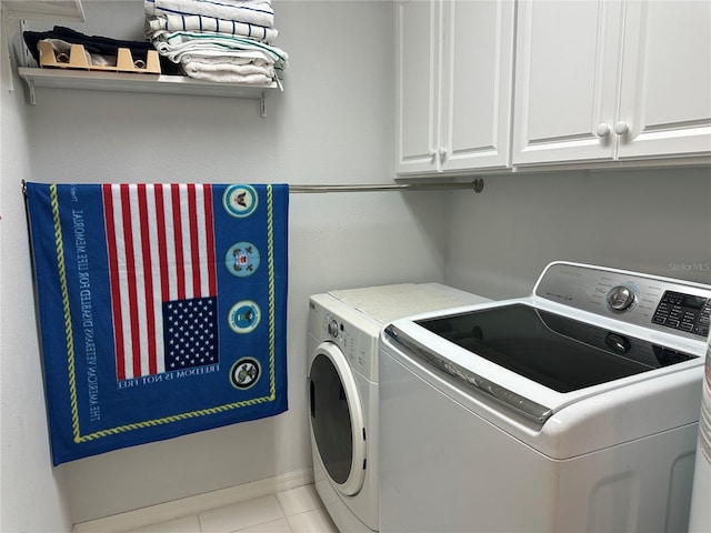 8809 White Sage Loop, Lakewood Ranch, FL 34202 - laundry room featuring separate washer and dryer, cabinet space, and tile patterned flooring