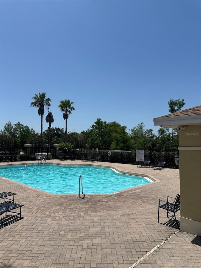 8809 White Sage Loop, Lakewood Ranch, FL 34202 - community pool featuring a patio area