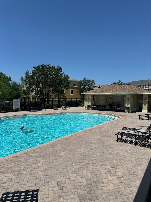 8809 White Sage Loop, Lakewood Ranch, FL 34202 - community pool with a patio area