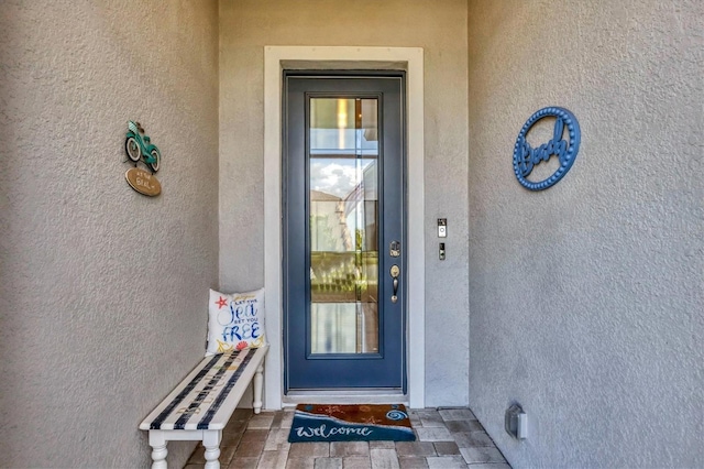 10347 Coastal Shores Dr, Parrish, FL 34219 - entrance to property featuring stucco siding