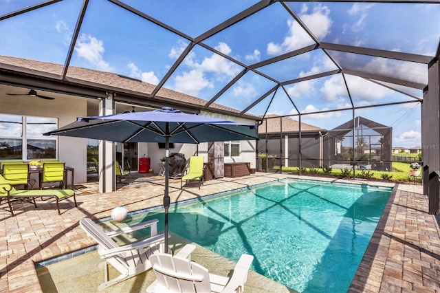10347 Coastal Shores Dr, Parrish, FL 34219 - swimming pool with a patio, a ceiling fan, and a lanai