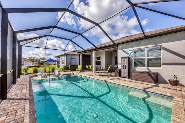 10347 Coastal Shores Dr, Parrish, FL 34219 - swimming pool with a patio area, ceiling fan, and a lanai