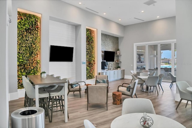 10347 Coastal Shores Dr, Parrish, FL 34219 - living area with light wood-style floors and recessed lighting