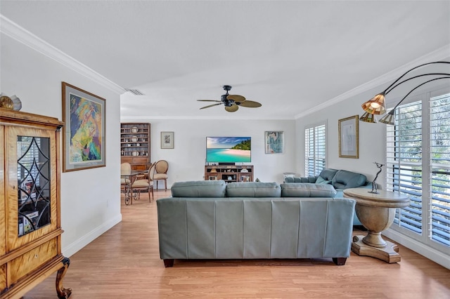 6962 Belgrave Dr, Sarasota, FL 34242 - living room featuring ornamental molding, light wood-type flooring, and ceiling fan