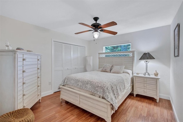 6962 Belgrave Dr, Sarasota, FL 34242 - bedroom featuring a closet, light wood-type flooring, and ceiling fan