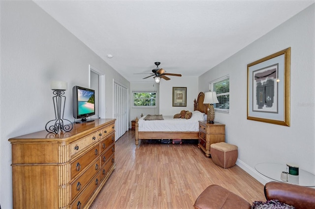 6962 Belgrave Dr, Sarasota, FL 34242 - bedroom featuring light wood finished floors, ceiling fan, and a closet