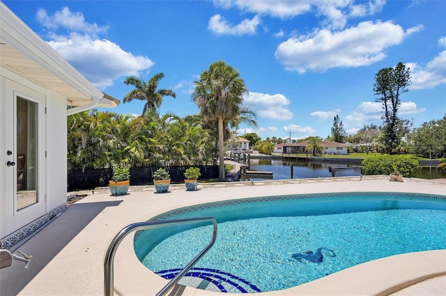 6962 Belgrave Dr, Sarasota, FL 34242 - outdoor pool with a water view and a patio
