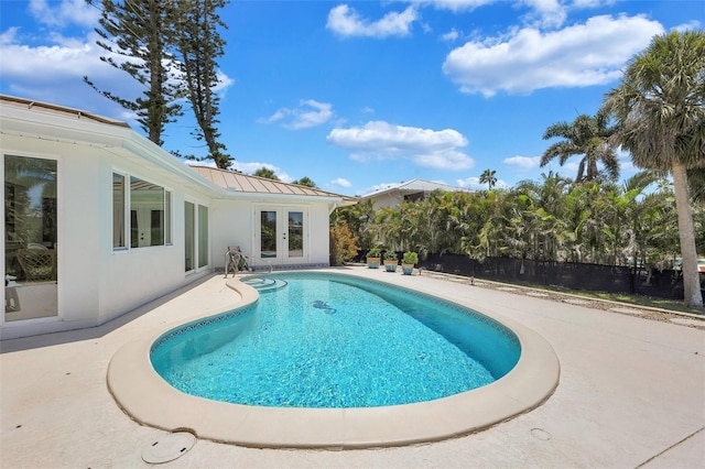 6962 Belgrave Dr, Sarasota, FL 34242 - view of pool with french doors and a patio