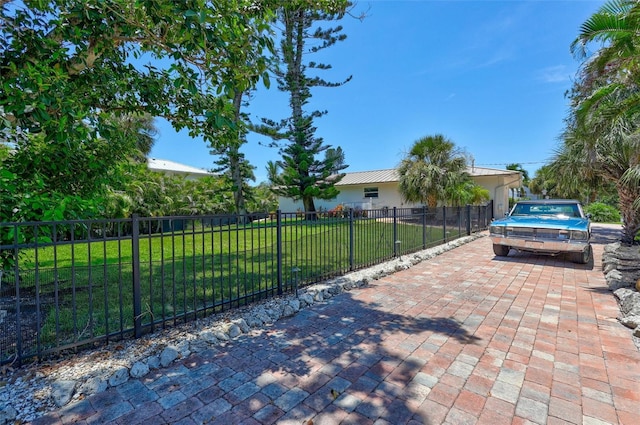 6962 Belgrave Dr, Sarasota, FL 34242 - view of patio with decorative driveway