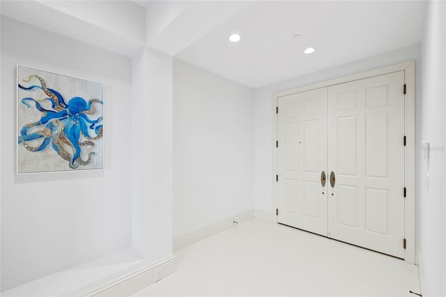 2251 Gulf Of Mexico Dr Unit 301, Longboat Key, FL 34228 - unfurnished bedroom featuring recessed lighting and a closet