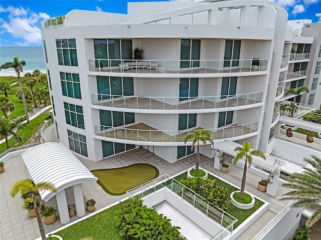 2251 Gulf Of Mexico Dr Unit 301, Longboat Key, FL 34228 - view of apartment building / complex featuring a water view