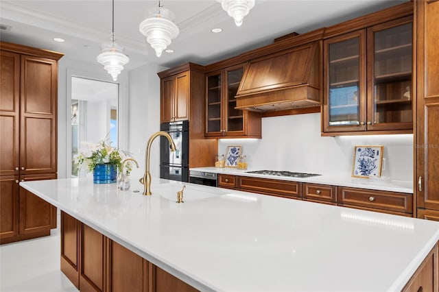 2251 Gulf Of Mexico Dr Unit 301, Longboat Key, FL 34228 - kitchen with gas cooktop, light countertops, recessed lighting, premium range hood, and pendant lighting