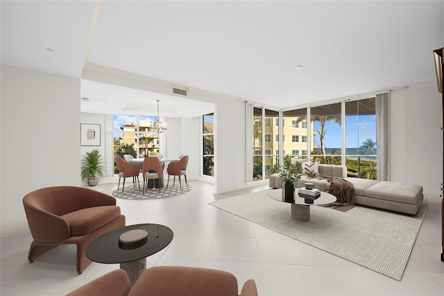 2251 Gulf Of Mexico Dr Unit 301, Longboat Key, FL 34228 - tiled living room with a chandelier