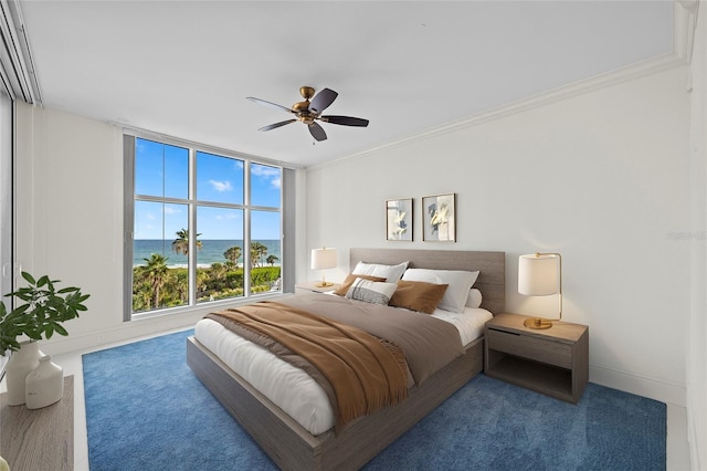 2251 Gulf Of Mexico Dr Unit 301, Longboat Key, FL 34228 - carpeted bedroom with ornamental molding, a water view, and a ceiling fan