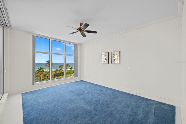 2251 Gulf Of Mexico Dr Unit 301, Longboat Key, FL 34228 - carpeted spare room featuring a ceiling fan, a water view, and ornamental molding