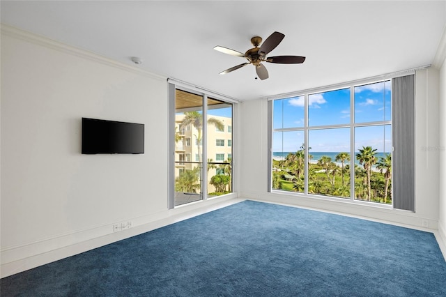 2251 Gulf Of Mexico Dr Unit 301, Longboat Key, FL 34228 - carpeted empty room with a ceiling fan, a smoke detector, and crown molding