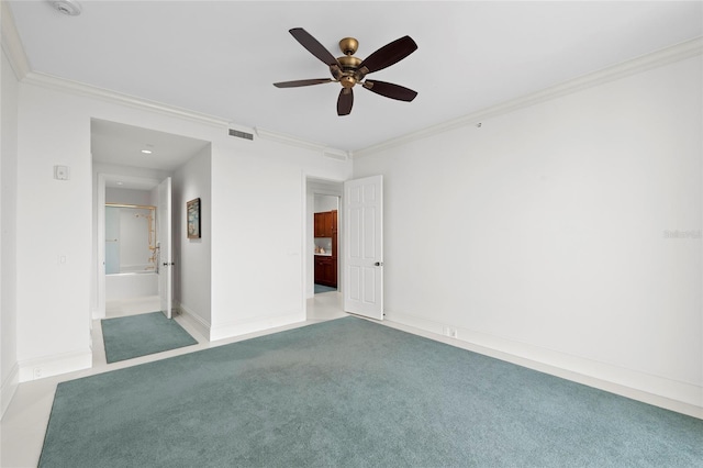 2251 Gulf Of Mexico Dr Unit 301, Longboat Key, FL 34228 - unfurnished bedroom with carpet flooring, crown molding, ensuite bath, and a ceiling fan