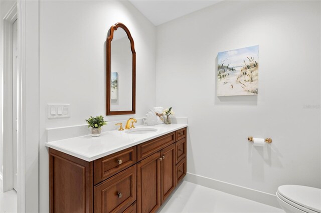 2251 Gulf Of Mexico Dr Unit 301, Longboat Key, FL 34228 - bathroom with toilet and vanity
