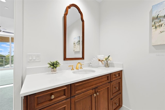 2251 Gulf Of Mexico Dr Unit 301, Longboat Key, FL 34228 - bathroom with vanity and ceiling fan