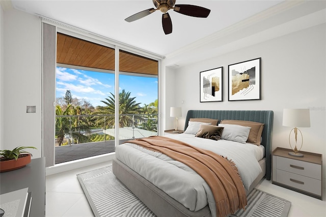 2251 Gulf Of Mexico Dr Unit 301, Longboat Key, FL 34228 - bedroom featuring access to outside, light tile patterned flooring, floor to ceiling windows, and ceiling fan