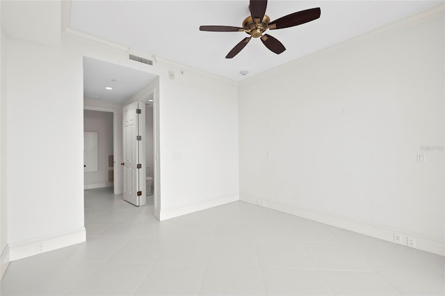 2251 Gulf Of Mexico Dr Unit 301, Longboat Key, FL 34228 - tiled empty room featuring ceiling fan and crown molding