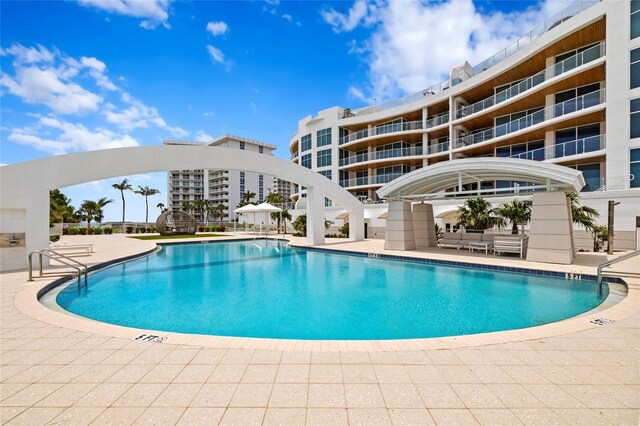 2251 Gulf Of Mexico Dr Unit 301, Longboat Key, FL 34228 - community pool featuring a patio area