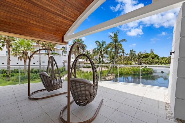 2251 Gulf Of Mexico Dr Unit 301, Longboat Key, FL 34228 - view of patio with a water view