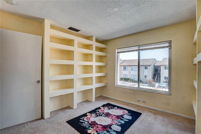 2716 Hidden Lake Blvd Unit C, Sarasota, FL 34237 - unfurnished office featuring carpet and a textured ceiling