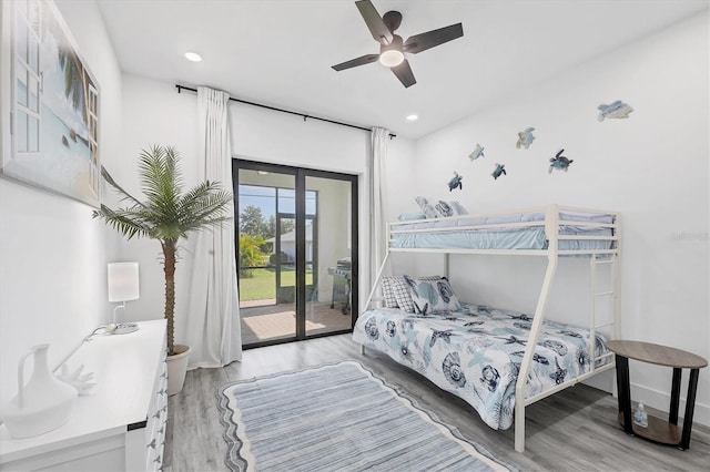 10270 Castanet Ave, Englewood, FL 34224 - bedroom with light wood-type flooring, access to exterior, ceiling fan, and recessed lighting