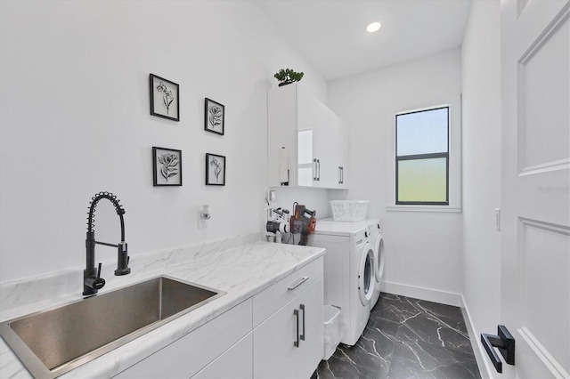 10270 Castanet Ave, Englewood, FL 34224 - laundry room with cabinet space, dark marble finish floors, washing machine and clothes dryer, and recessed lighting