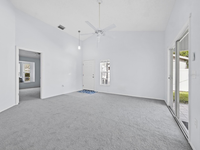 3223 Jamaica St, Sarasota, FL 34231 - unfurnished room with carpet, a ceiling fan, and high vaulted ceiling