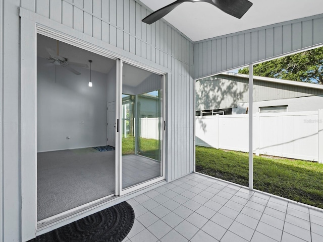 3223 Jamaica St, Sarasota, FL 34231 - unfurnished sunroom featuring a ceiling fan and healthy amount of natural light