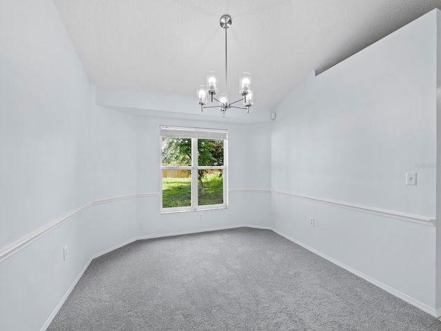 3223 Jamaica St, Sarasota, FL 34231 - carpeted empty room featuring a chandelier and baseboards