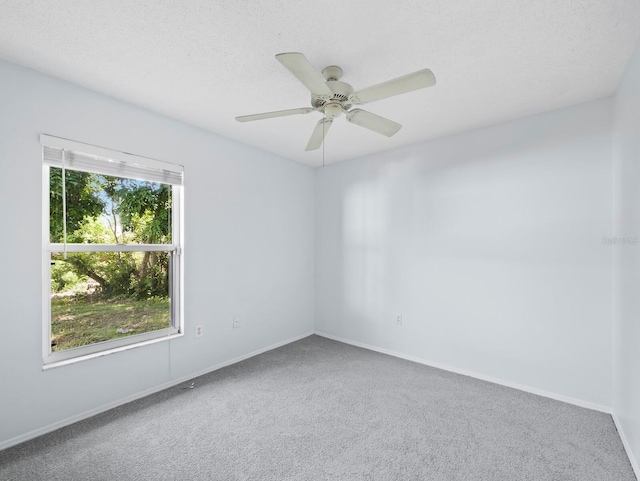 3223 Jamaica St, Sarasota, FL 34231 - carpeted empty room featuring baseboards and ceiling fan