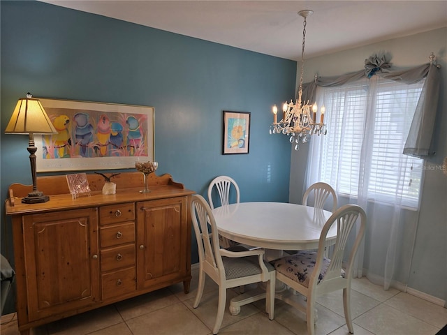 5850 Welcome Rd Unit J6, Bradenton, FL 34207 - dining area with light tile patterned flooring and a chandelier