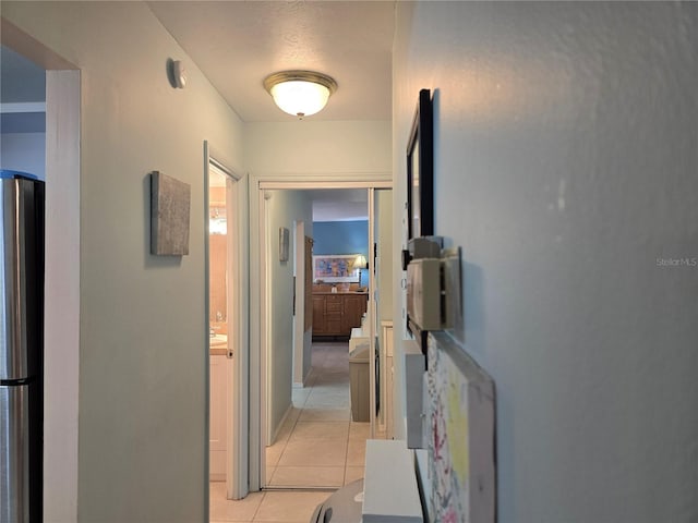 5850 Welcome Rd Unit J6, Bradenton, FL 34207 - corridor featuring light tile patterned floors