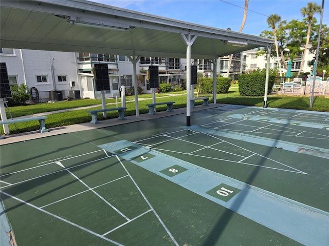5850 Welcome Rd Unit J6, Bradenton, FL 34207 - view of community with a lawn and shuffleboard