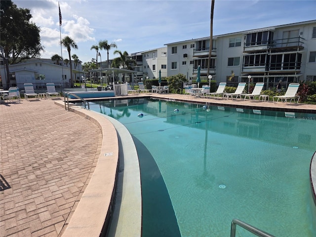 5850 Welcome Rd Unit J6, Bradenton, FL 34207 - community pool featuring a residential view