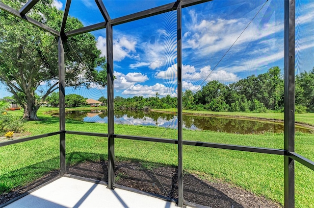 7039 Woodmore Ter, Lakewood Ranch, FL 34202 - unfurnished sunroom featuring a water view and view of scattered trees