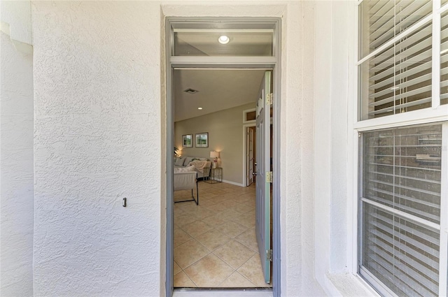 7039 Woodmore Ter, Lakewood Ranch, FL 34202 - doorway to property featuring stucco siding