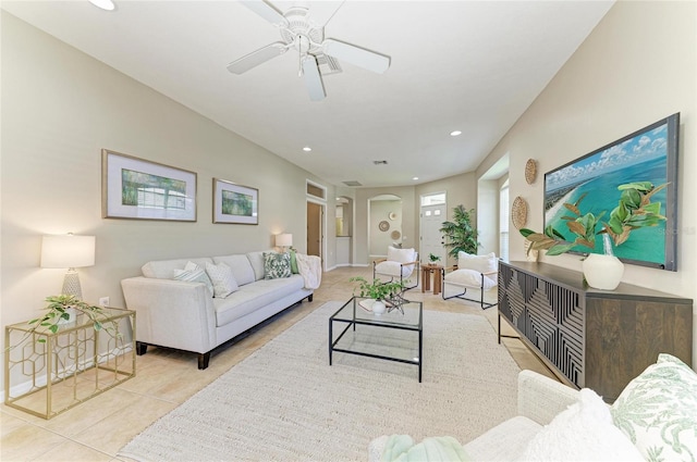 7039 Woodmore Ter, Lakewood Ranch, FL 34202 - tiled living area featuring a ceiling fan, recessed lighting, and arched walkways