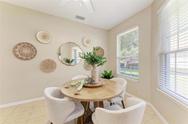 7039 Woodmore Ter, Lakewood Ranch, FL 34202 - dining room featuring light tile patterned floors and ceiling fan