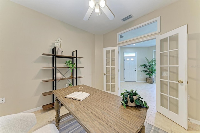 7039 Woodmore Ter, Lakewood Ranch, FL 34202 - home office featuring french doors, tile patterned floors, and ceiling fan