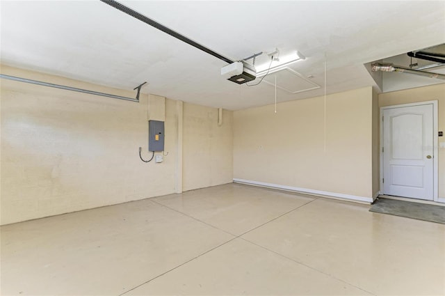 7039 Woodmore Ter, Lakewood Ranch, FL 34202 - garage featuring electric panel and a garage door opener