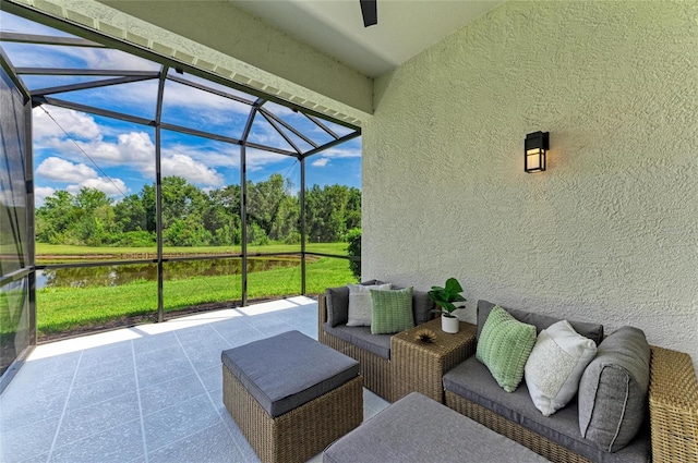 7039 Woodmore Ter, Lakewood Ranch, FL 34202 - view of patio featuring glass enclosure, a water view, and view of wooded area