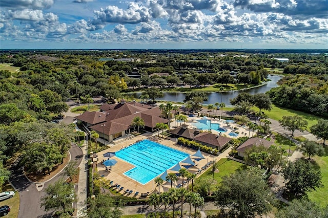7039 Woodmore Ter, Lakewood Ranch, FL 34202 - drone / aerial view of a pool area and a large body of water