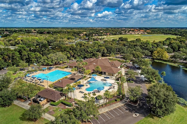 7039 Woodmore Ter, Lakewood Ranch, FL 34202 - drone / aerial view of a pool and a nearby body of water