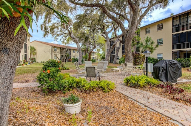 2220 Stickney Point Rd Unit 528, Sarasota, FL 34231 - view of yard with a patio